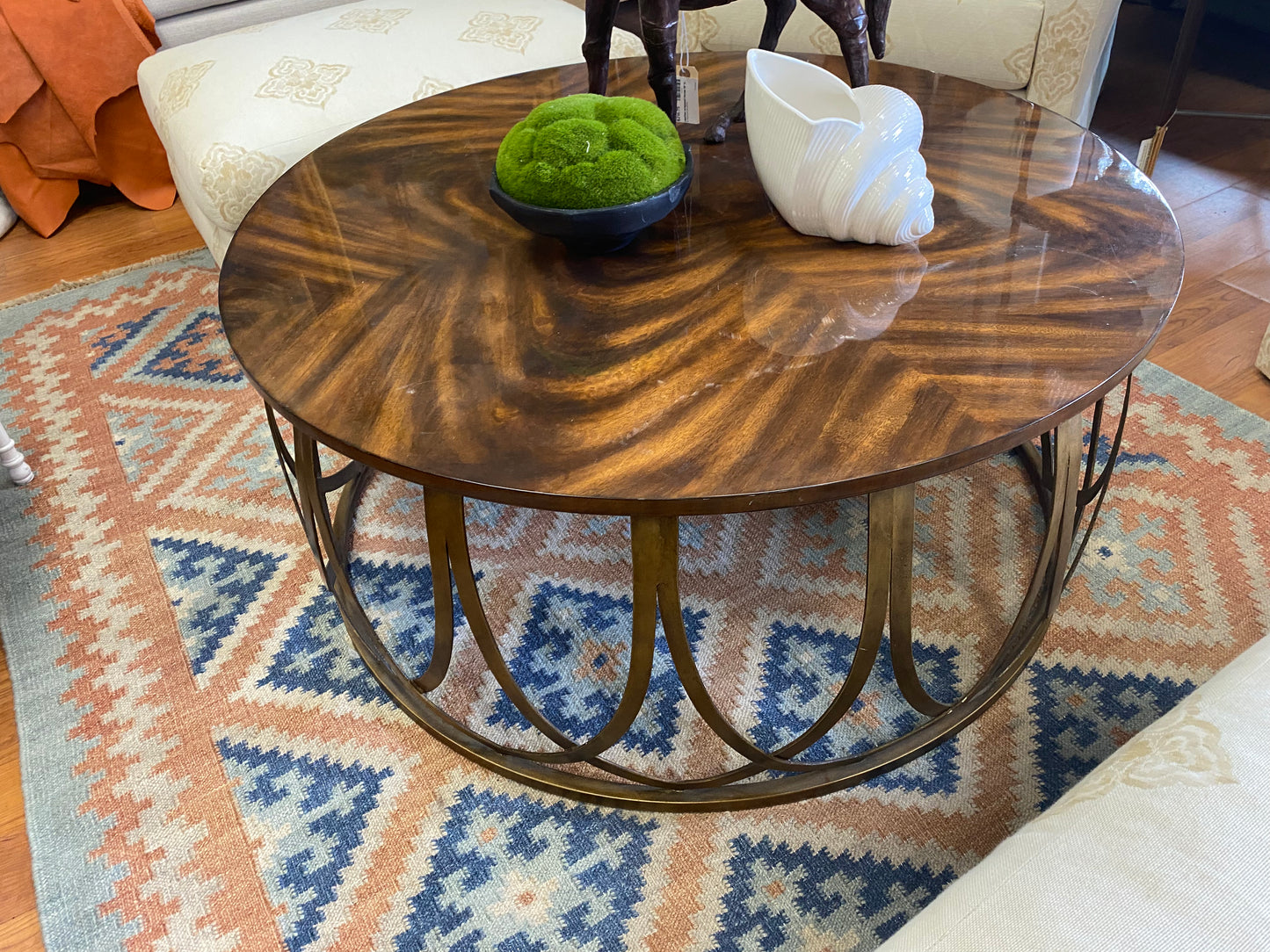 Tortoise round coffee table with brass base