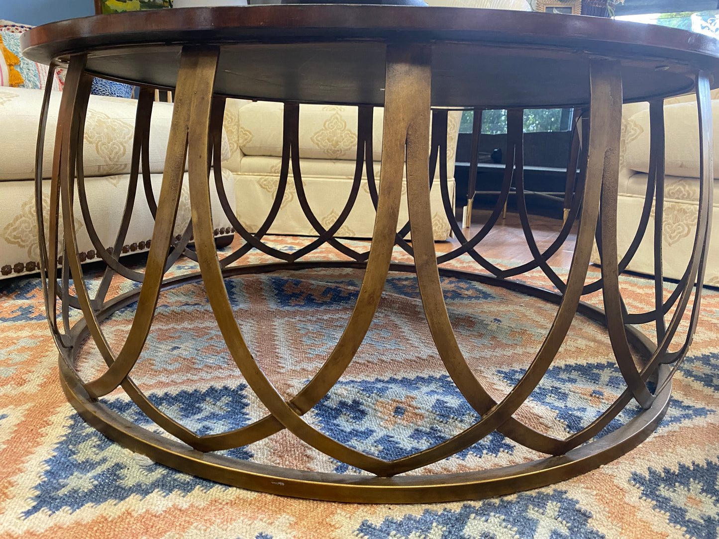 Tortoise round coffee table with brass base