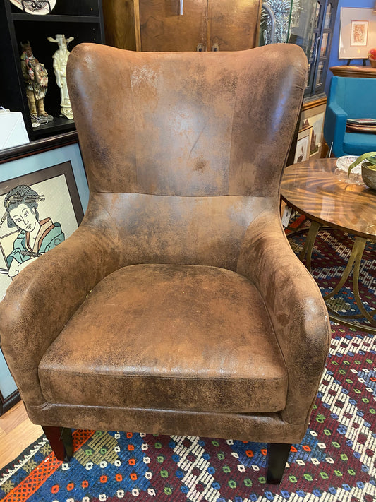 Cognac faux leather distressed wingback chair